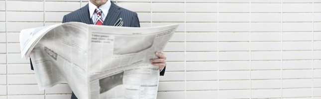 Reading newspaper